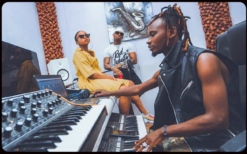 Musicians recording in a studio